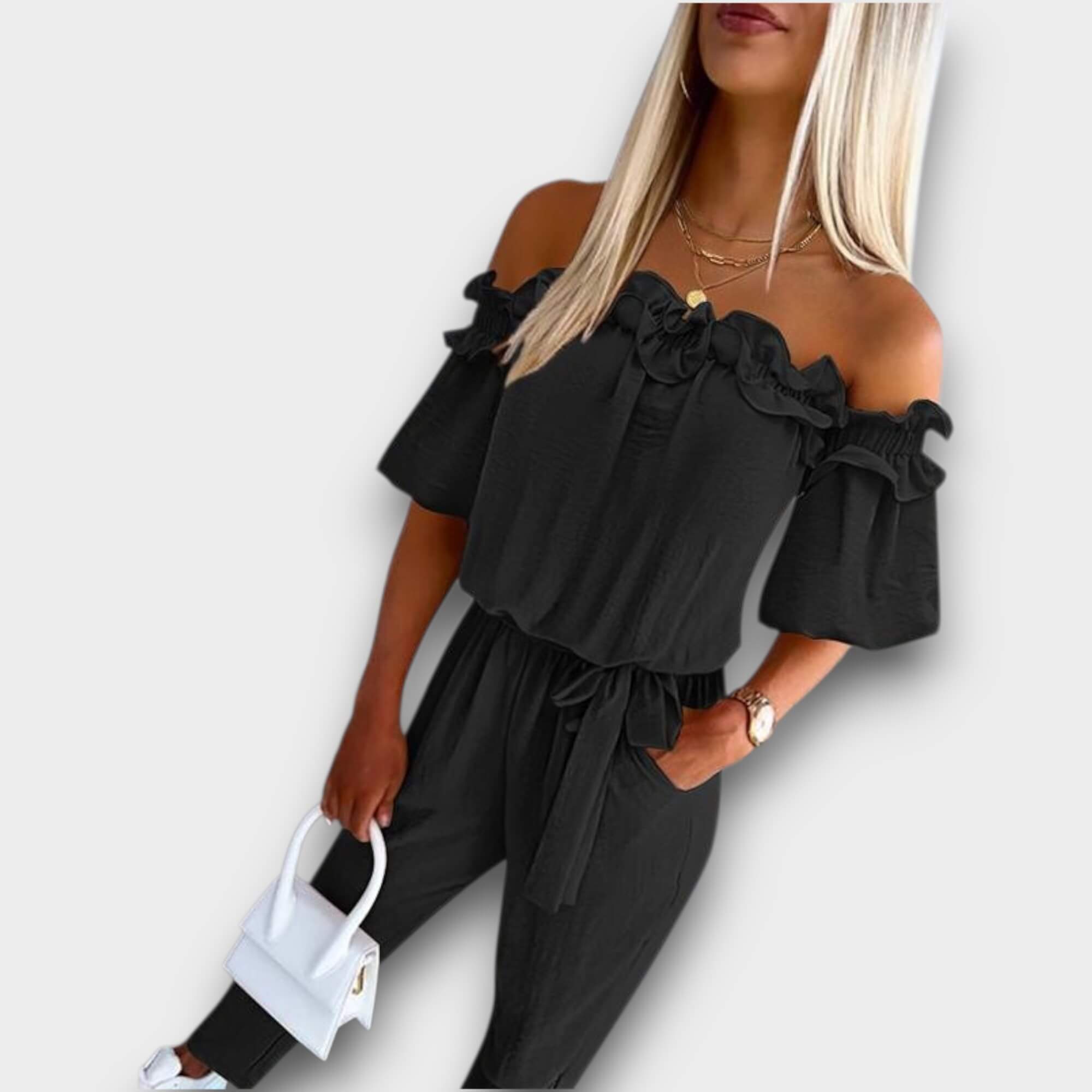 Aria – Schulterfreier Jumpsuit mit Rüschen und Bindegürtel